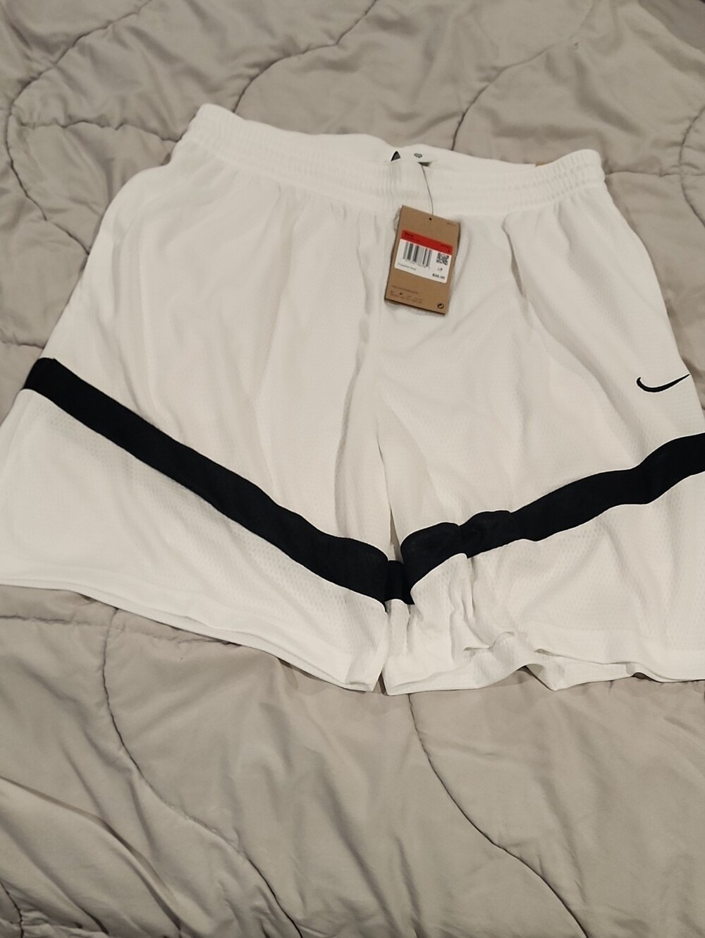 Nike White Athletic Mesh Shorts with Black Stripe Accent